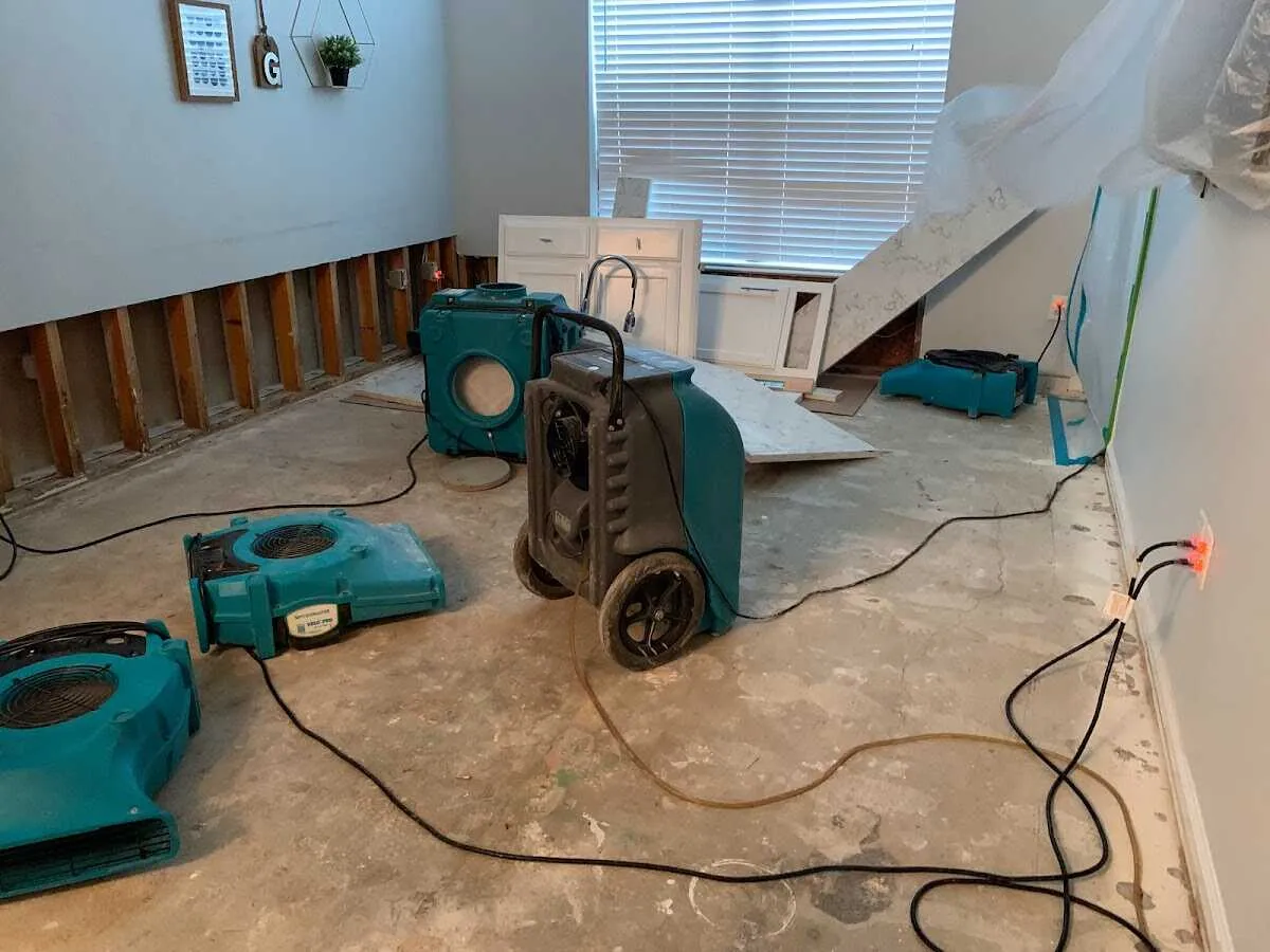 Dehumidifier in flood-cut room for Water Damage Restoration in Bull Run